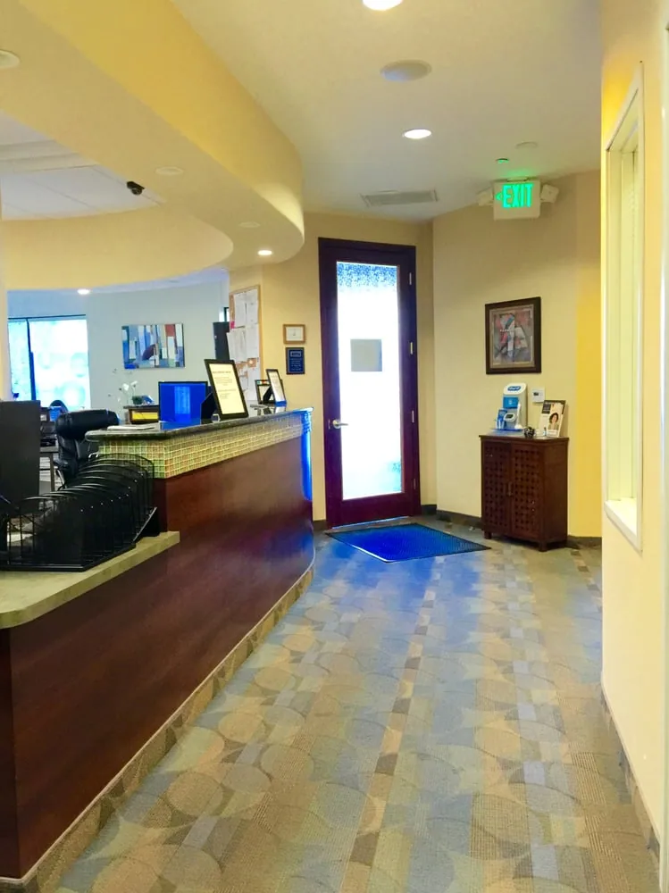 Front desk and reception counter seen from the hallway