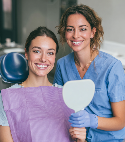 kiavallc_A_smiling_female_dental_patient_sits_in_a_dental_chair_1e598698-3ab3-4faf-81a5-12eb41393ab2